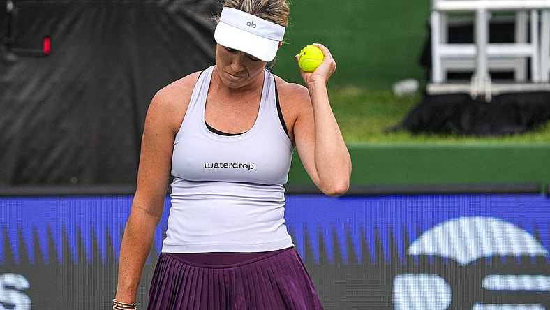American Tennis Player Danielle Collins holds up a ball after scoring during her ATX Open Round 16 match against Caty McNally at the Westwood Country Club on Thursday, March. 2, 2023 in Austin.