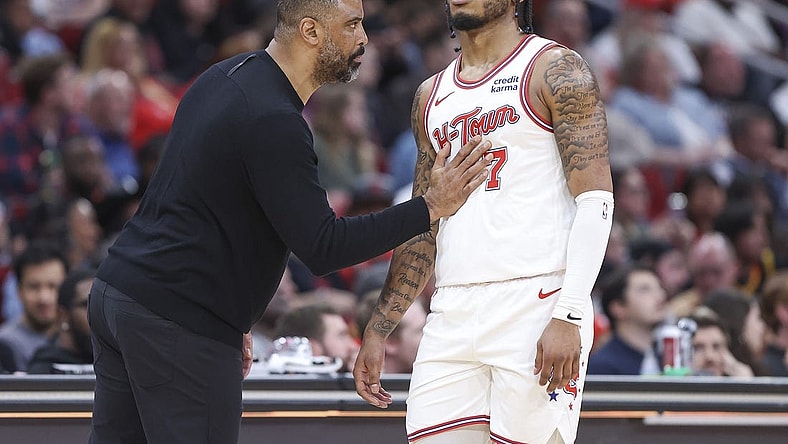 Feb 23, 2024; Houston, Texas, USA; Houston Rockets head coach Ime Udoka talks with forward Cam Whitmore (7) during the third quarter against the Phoenix Suns at Toyota Center. Mandatory Credit: Troy Taormina-USA TODAY Sports
