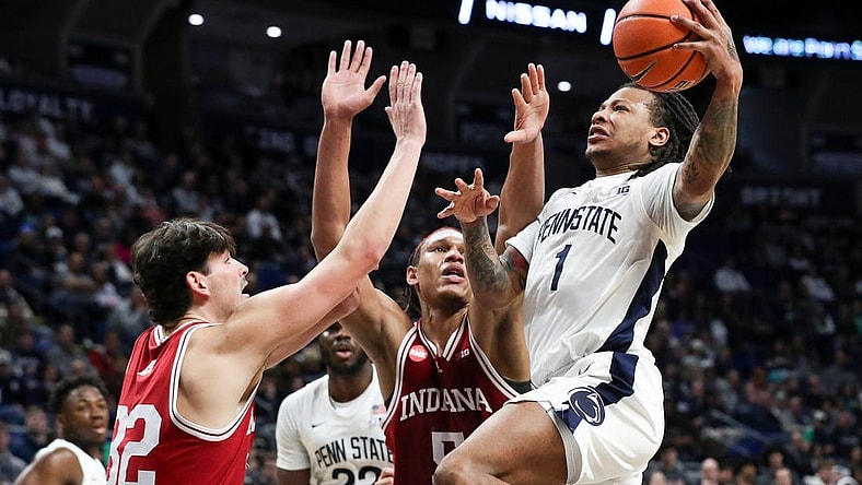 Feb 24, 2024; University Park, Pennsylvania, USA; Penn State Nittany Lions guard Ace Baldwin Jr (1) drives to the basket as Indiana Hoosiers guard Trey Galloway (32) defends during the first half at Bryce Jordan Center. Mandatory Credit: Matthew O'Haren-USA TODAY Sports