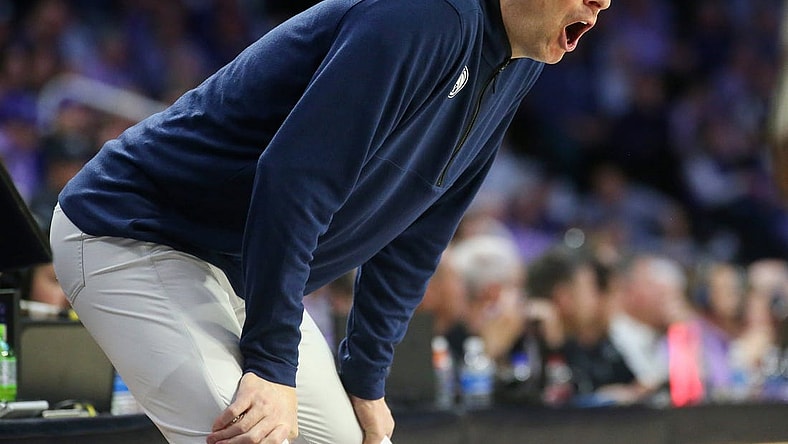 Feb 24, 2024; Manhattan, Kansas, USA; Brigham Young Cougars head coach Mark Pope yells at his team during the first half against the Kansas State Wildcats at Bramlage Coliseum. Mandatory Credit: Scott Sewell-USA TODAY Sports
