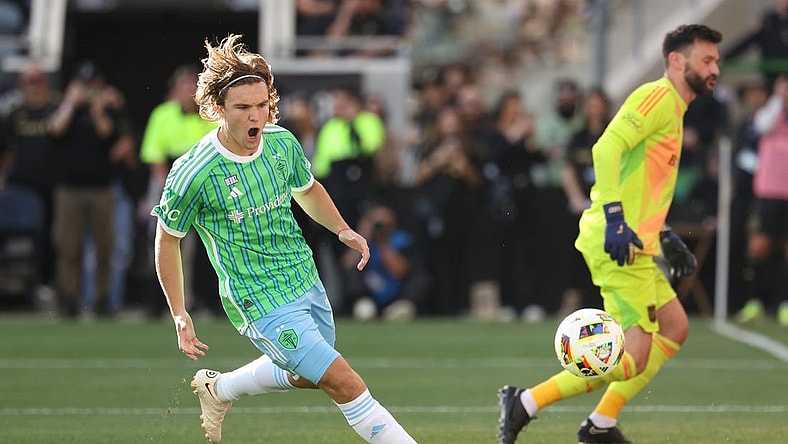 Feb 24, 2024; Los Angeles, California, USA; Seattle Sounders FC forward Pedro de la Vega (10) reacts after scoring on a penalty kick against LAFC goalkeeper Hugo Lloris (1) during the second half at BMO Stadium. Mandatory Credit: Kiyoshi Mio-USA TODAY Sports