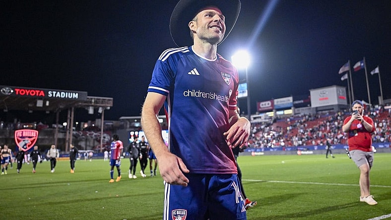 Feb 24, 2024; Frisco, Texas, USA; FC Dallas midfielder Asier Illarramendi (14) celebrates with the cowboy hat after FC Dallas defeats San Jose Earthquakes 2-1 at Toyota Stadium. Mandatory Credit: Jerome Miron-USA TODAY Sports