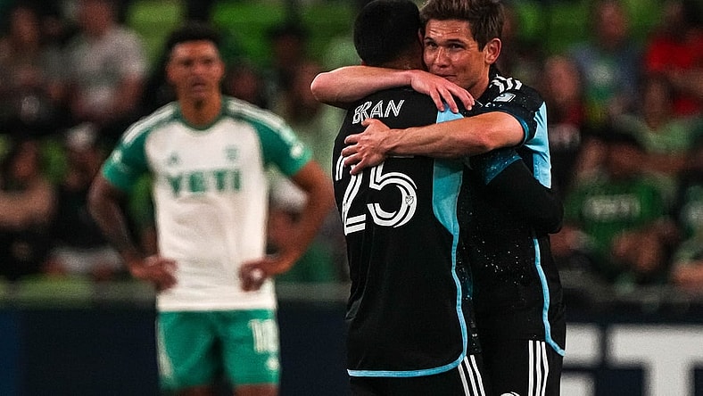 Minnesota United FC midfielders Alejandro Bran (25) and Wil Trapp (20) celebrate as time expires in the match against Austin FC at Q2 stadium on Feb. 24, 2024 in Austin. Minnesota defeated Austin 2-1.