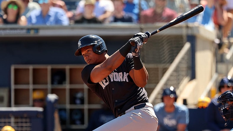 Feb 27, 2024; Port Charlotte, Florida, USA;  New York Yankees outfielder Oscar Gonzalez (72) singles during the second inning against the Tampa Bay Rays at Charlotte Sports Park. Mandatory Credit: Kim Klement Neitzel-USA TODAY Sports