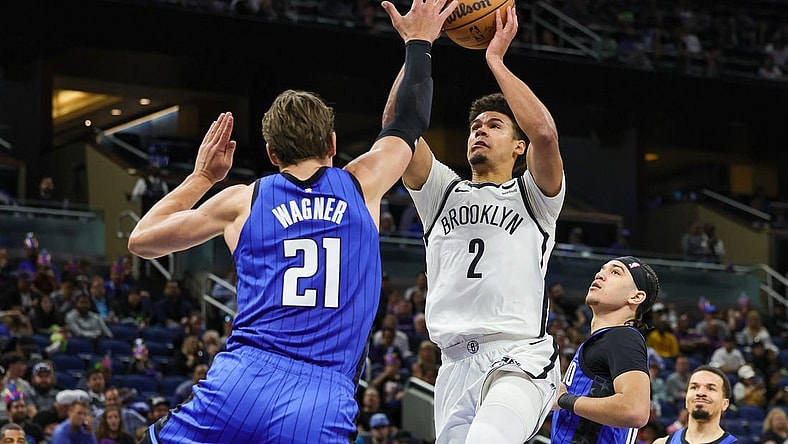 Feb 27, 2024; Orlando, Florida, USA; Brooklyn Nets forward Cameron Johnson (2) goes to the basket against Orlando Magic center Moritz Wagner (21) during the second half at Amway Center. Mandatory Credit: Mike Watters-USA TODAY Sports