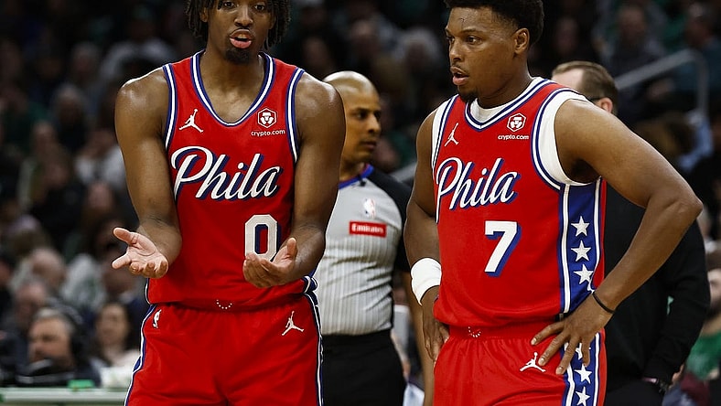 Feb 27, 2024; Boston, Massachusetts, USA; Philadelphia 76ers' Tyrese Maxey (0) talks with Kyle Lowry (7) during the second half of their loss to the Boston Celtics at TD Garden. Mandatory Credit: Winslow Townson-USA TODAY Sports