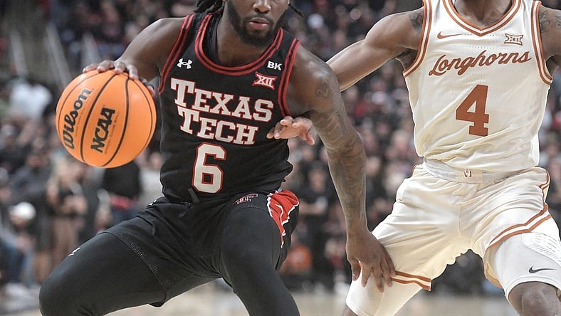 Texas Tech's guard Joe Toussaint (6) dribbles the ball against Texas in a Big 12 basketball game, Tuesday, Feb. 27, 2024, at United Supermarkets Arena.