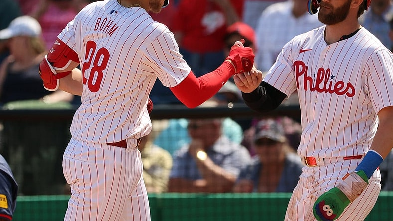 Feb 28, 2024; Clearwater, Florida, USA; Philadelphia Phillies infielder Alex Bohm (28) is congratulated by first baseman Bryce Harper (3) after he hit a two-run home run during the first inning against the Atlanta Braves  at BayCare Ballpark. Mandatory Credit: Kim Klement Neitzel-USA TODAY Sports