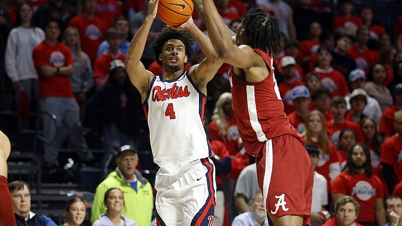 Feb 28, 2024; Oxford, Mississippi, USA; Mississippi Rebels forward Jaemyn Brakefield (4) shoots for three during the second half against the Alabama Crimson Tide at The Sandy and John Black Pavilion at Ole Miss. Mandatory Credit: Petre Thomas-USA TODAY Sports