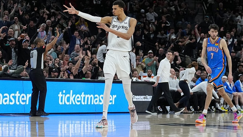 Feb 29, 2024; San Antonio, Texas, USA;  San Antonio Spurs center Victor Wembanyama (1) celebrates a three point shot in the second half against the Oklahoma City Thunder at Frost Bank Center. Mandatory Credit: Daniel Dunn-USA TODAY Sports
