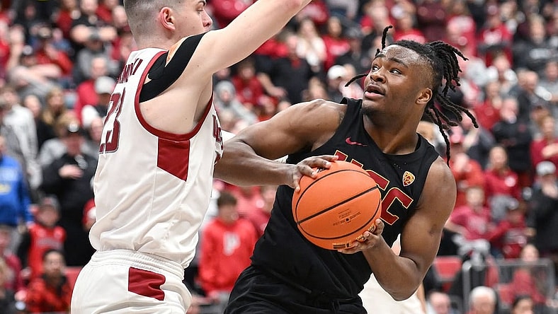 Feb 29, 2024; Pullman, Washington, USA; USC Trojans guard Isaiah Collier (1) shoots the ball againstWashington State Cougars forward Andrej Jakimovski (23) in the second half at Friel Court at Beasley Coliseum. Washington State Cougars won 75-72. Mandatory Credit: James Snook-USA TODAY Sports