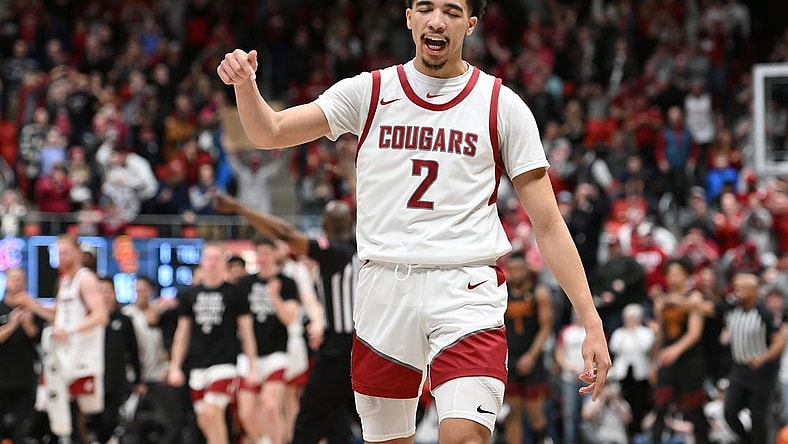 Feb 29, 2024; Pullman, Washington, USA; Washington State Cougars guard Myles Rice (2) celebrates during a time out during a game against the USC Trojans in the second half at Friel Court at Beasley Coliseum. Washington State Cougars won 75-72. Mandatory Credit: James Snook-USA TODAY Sports