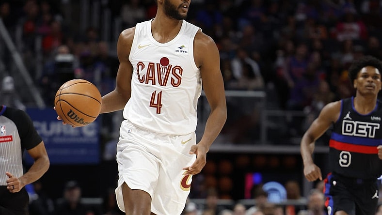 Mar 1, 2024; Detroit, Michigan, USA;  Cleveland Cavaliers forward Evan Mobley (4) dribbles in the first half against the Detroit Pistons at Little Caesars Arena. Mandatory Credit: Rick Osentoski-USA TODAY Sports
