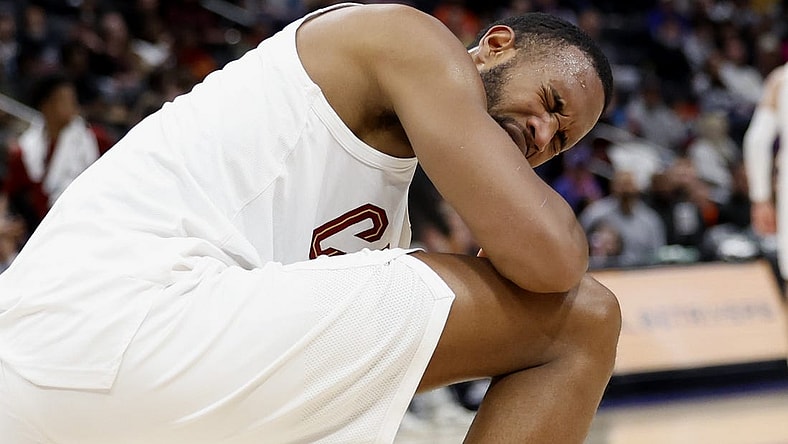 Mar 1, 2024; Detroit, Michigan, USA; Cleveland Cavaliers forward Evan Mobley (4) reacts after he is poked in the eye in the first half against the Detroit Pistons at Little Caesars Arena. Mandatory Credit: Rick Osentoski-USA TODAY Sports