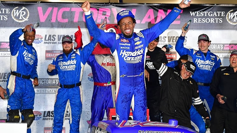 Mar 1, 2024; Las Vegas, Nevada, USA; NASCAR Truck Series driver Rajah Caruth (71) celebrates his victory of the Victorias Voice Foundation 200 at Las Vegas Motor Speedway. Mandatory Credit: Gary A. Vasquez-USA TODAY Sports