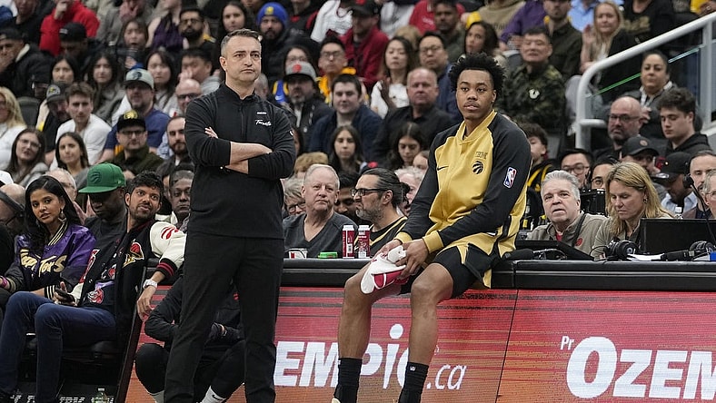 Mar 1, 2024; Toronto, Ontario, CAN; Toronto Raptors head coach Darko Rajakovic and forward Scottie Barnes (4) wait for a stoppage in play against the Golden State Warriors during the first half at Scotiabank Arena. Mandatory Credit: John E. Sokolowski-USA TODAY Sports