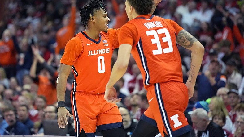 Mar 2, 2024; Madison, Wisconsin, USA; Illinois Fighting Illini guard Terrence Shannon Jr. (0) celebrates scoring a three-point basket with teammate Illinois Fighting Illini forward Coleman Hawkins (33) during the first half against the Wisconsin Badgers at the Kohl Center. Mandatory Credit: Kayla Wolf-USA TODAY Sports