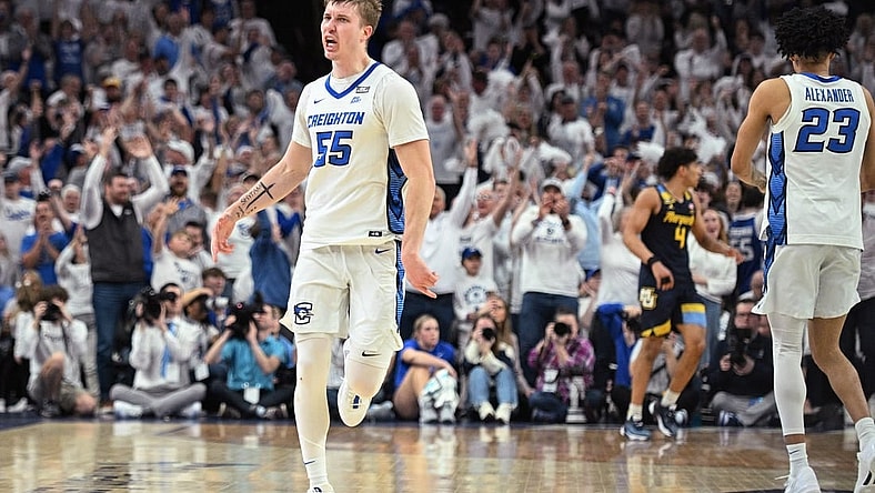 Mar 2, 2024; Omaha, Nebraska, USA; Creighton Bluejays guard Baylor Scheierman (55) celebrates a three point basket against the Marquette Golden Eagles in the second half at CHI Health Center Omaha. Mandatory Credit: Steven Branscombe-USA TODAY Sports