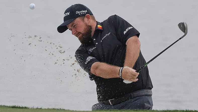 Mar 2, 2024; Palm Beach Gardens, Florida, USA;  Shane Lowry hits from the bunker onto the 18th green during the third round of the Cognizant Classic in The Palm Beaches golf tournament. Mandatory Credit: Reinhold Matay-USA TODAY Sports