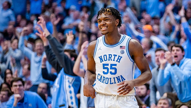 Mar 2, 2024; Chapel Hill, North Carolina, USA; North Carolina Tar Heels forward Harrison Ingram (55) celebrates after a three point basket against the North Carolina State Wolfpack during the second half at Dean E. Smith Center. Mandatory Credit: Scott Kinser-USA TODAY Sports