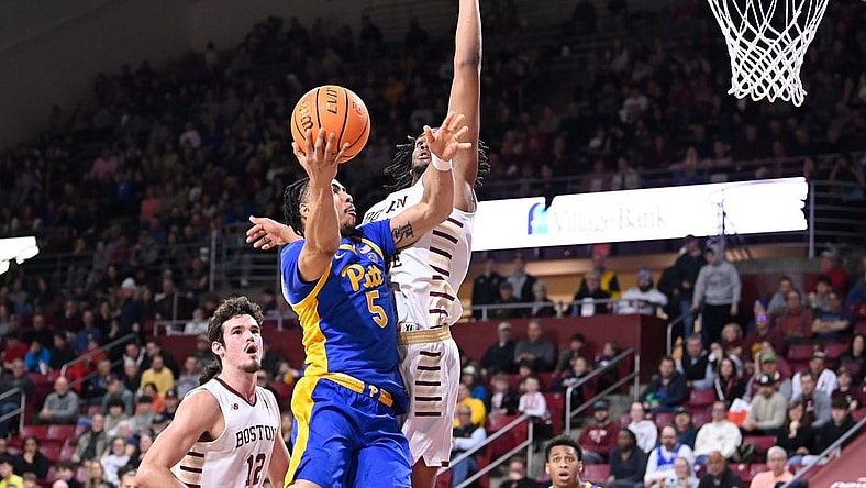Mar 2, 2024; Chestnut Hill, Massachusetts, USA; Pittsburgh Panthers guard Ishmael Leggett (5) shoots a lay up against the Boston College Eagles during the first half at Conte Forum. Mandatory Credit: Eric Canha-USA TODAY Sports