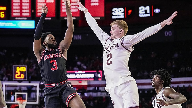 Mar 2, 2024; Athens, Georgia, USA; Georgia Bulldogs guard Noah Thomasson (3) shoots over Texas A&M Aggies guard Hayden Hefner (2) during the first half at Stegeman Coliseum. Mandatory Credit: Dale Zanine-USA TODAY Sports