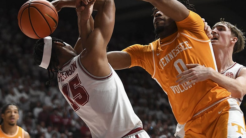 Mar 2, 2024; Tuscaloosa, Alabama, USA;  Alabama forward Jarin Stevenson (15) and Tennessee forward Jonas Aiddo (0) fight for a rebound that gets knocked out of bounds at Coleman Coliseum. Mandatory Credit: Gary Cosby Jr.-USA TODAY Sports