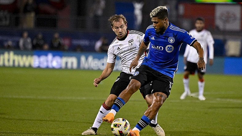 Mar 2, 2024; Frisco, Texas, USA; FC Dallas midfielder Paxton Pomykal (19) and CF Montreal forward Josef Martinez (17) battle for control of the ball during the second half at Toyota Stadium. Mandatory Credit: Jerome Miron-USA TODAY Sports
