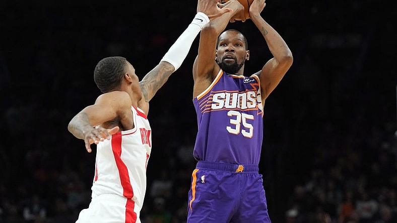 Mar 2, 2024; Phoenix, Arizona, USA; Phoenix Suns forward Kevin Durant (35) shoots against the Houston Rockets during the second half at Footprint Center. Mandatory Credit: Joe Camporeale-USA TODAY Sports