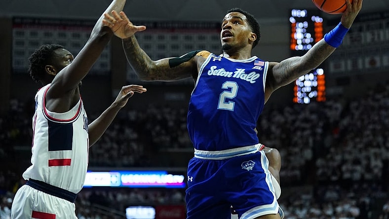 Mar 3, 2024; Storrs, Connecticut, USA; Seton Hall Pirates guard Al-Amir Dawes (2) shoots against UConn Huskies guard Hassan Diarra (10) in the first half at Harry A. Gampel Pavilion. Mandatory Credit: David Butler II-USA TODAY Sports