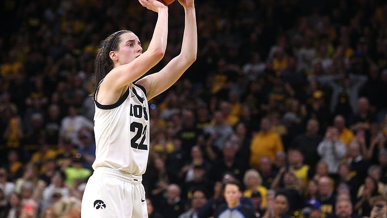 Iowa   s Caitlin Clark (22) breaks Pete Maravich   s NCAA Division I scoring record while playing Ohio State Sunday, March 3, 2024 at Carver-Hawkeye Arena in Iowa City, Iowa.