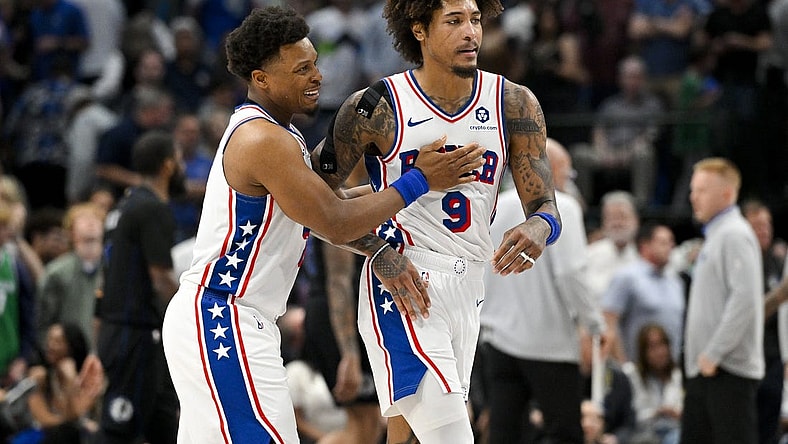 Mar 3, 2024; Dallas, Texas, USA; Philadelphia 76ers guard Kyle Lowry (7) and guard Kelly Oubre Jr. (9) celebrate during the second half against the Dallas Mavericks at the American Airlines Center. Mandatory Credit: Jerome Miron-USA TODAY Sports