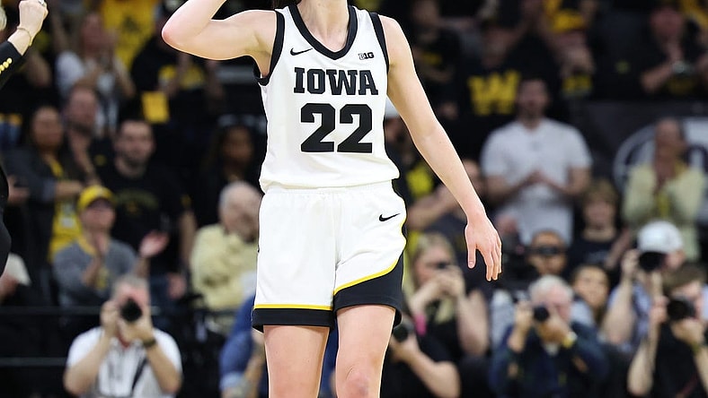 Mar 3, 2024; Iowa City, Iowa, USA; Iowa Hawkeyes guard Caitlin Clark (22) celebrates the win over the Ohio State Buckeyes during the second half at Carver-Hawkeye Arena. Mandatory Credit: Reese Strickland-USA TODAY Sports