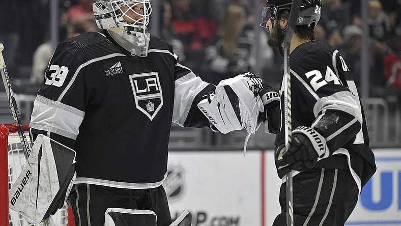Mar 3, 2024; Los Angeles, California, USA; Los Angeles Kings center Phillip Danault (24) is congratulated by goaltender Cam Talbot (39) after scoring a hat trick in the third period against the New Jersey Devils at Crypto.com Arena. Mandatory Credit: Jayne Kamin-Oncea-USA TODAY Sports