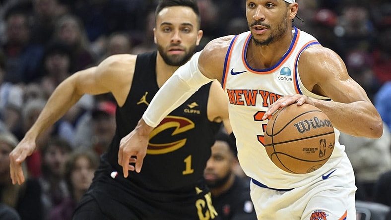 Mar 3, 2024; Cleveland, Ohio, USA; New York Knicks guard Josh Hart (3) dribbles beside Cleveland Cavaliers guard Max Strus (1) in the second quarter at Rocket Mortgage FieldHouse. Mandatory Credit: David Richard-USA TODAY Sports