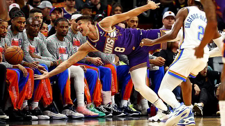 Mar 3, 2024; Phoenix, Arizona, USA; Phoenix Suns guard Grayson Allen (8) tries to save the ball from going out of bounds against Oklahoma City Thunder guard Shai Gilgeous-Alexander (2) during the first quarter at Footprint Center. Mandatory Credit: Mark J. Rebilas-USA TODAY Sports