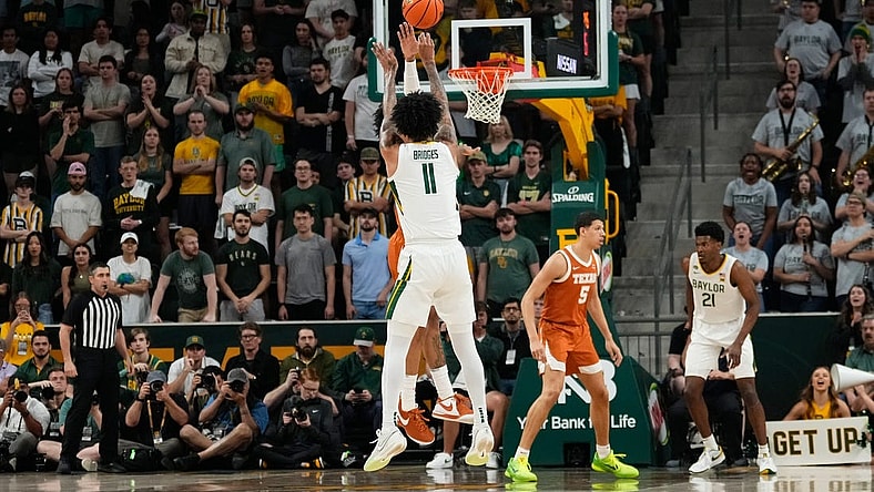 Mar 4, 2024; Waco, Texas, USA;  Baylor Bears forward Jalen Bridges (11) scores a three point basket against the Texas Longhorns during the first half at Paul and Alejandra Foster Pavilion. Mandatory Credit: Chris Jones-USA TODAY Sports