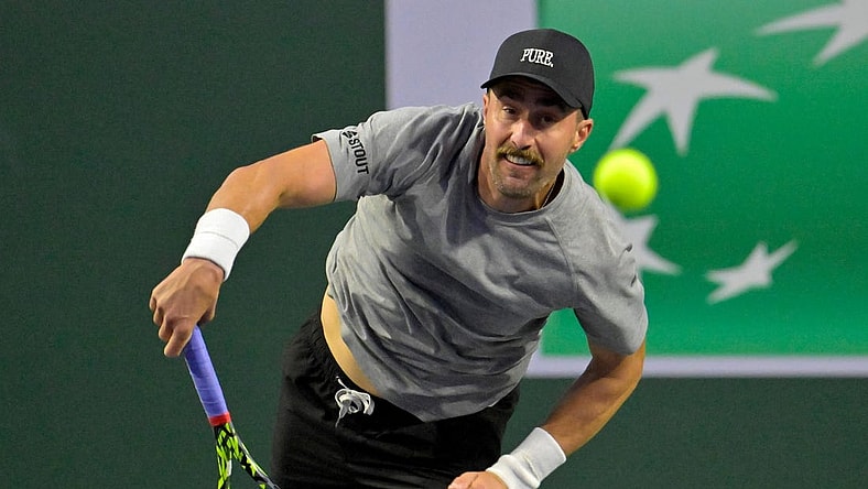 Mar 4, 2024; Indian Wells, CA, USA;  Steve Johnson (USA) hits a shot during his qualifying match against Emilio Nava (USA) in the BNP Paribas Open at the Indian Wells Tennis Garden. Mandatory Credit: Jayne Kamin-Oncea-USA TODAY Sports