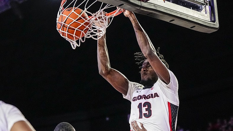Mar 5, 2024; Athens, Georgia, USA; Georgia Bulldogs forward Dylan James (13) dunks against the Mississippi Rebels during the first half at Stegeman Coliseum. Mandatory Credit: Dale Zanine-USA TODAY Sports
