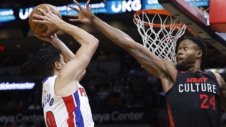 Mar 5, 2024; Miami, Florida, USA; Miami Heat forward Haywood Highsmith (24) defends Detroit Pistons forward Simone Fontecchio (19) during the first half at Kaseya Center. Mandatory Credit: Rhona Wise-USA TODAY Sports