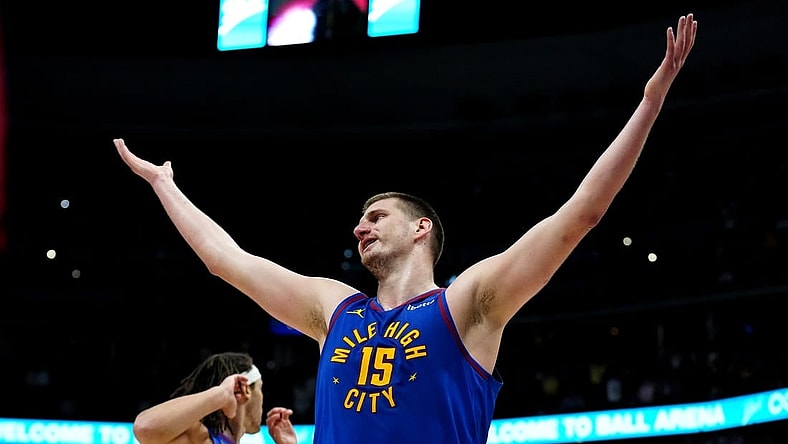 Mar 5, 2024; Denver, Colorado, USA; Denver Nuggets center Nikola Jokic (15) reacts to a foul in the second half against the Phoenix Suns at Ball Arena. Mandatory Credit: Ron Chenoy-USA TODAY Sports