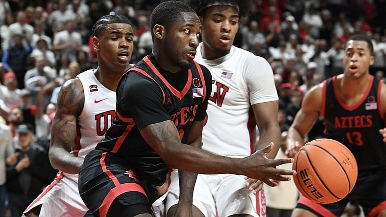 Mar 5, 2024; Las Vegas, Nevada, USA; San Diego State Aztecs guard Darrion Trammell (12) passes the ball against the UNLV Rebels in the second half at Thomas & Mack Center. Mandatory Credit: Candice Ward-USA TODAY Sports