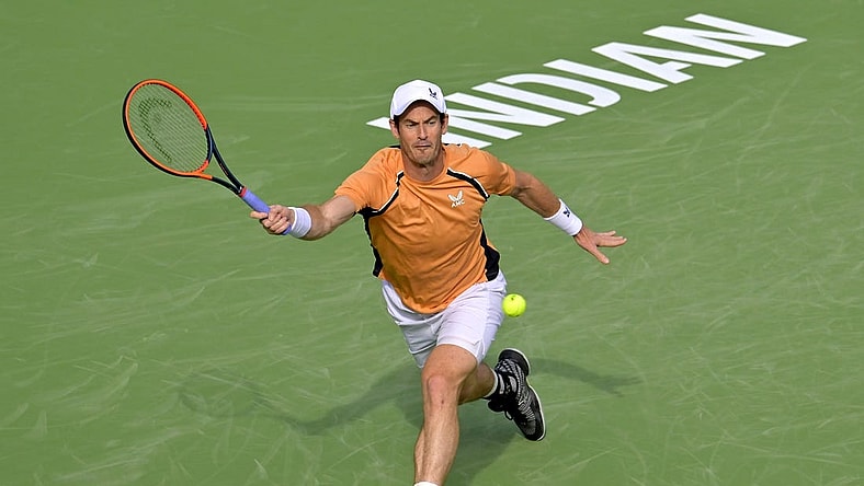 Mar 6, 2024; Indian Wells, CA, USA;  Andy Murray (GBR) hits a shot in his first round match against David Goffin (BEL) the BNP Paribas Open at the Indian Wells Tennis Garden. Mandatory Credit: Jayne Kamin-Oncea-USA TODAY Sports