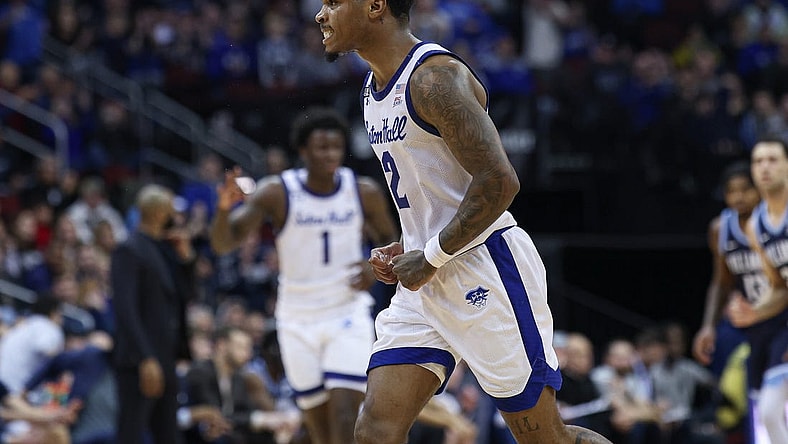 Mar 6, 2024; Newark, New Jersey, USA; Seton Hall Pirates guard Al-Amir Dawes (2) reacts after a three point basket during the first half against the Villanova Wildcats at Prudential Center. Mandatory Credit: Vincent Carchietta-USA TODAY Sports