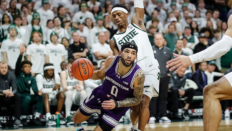 Michigan State guard Tyson Walker (2) defends Northwestern guard Boo Buie (0) during the first half at Breslin Center in East Lansing on Wednesday, March 6, 2024.