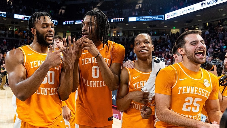 Mar 6, 2024; Columbia, South Carolina, USA; Tennessee Volunteers guard Josiah-Jordan James (30), forward Jonas Aidoo (0), guard Jordan Gainey (2) and guard Santiago Vescovi (25) celebrate following their win against the South Carolina Gamecocks at Colonial Life Arena. Mandatory Credit: Jeff Blake-USA TODAY Sports
