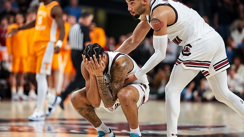 Mar 6, 2024; Columbia, South Carolina, USA; South Carolina Gamecocks guard Jacobi Wright (1) consoles guard Ta’Lon Cooper (55) in the closing moments of their loss to the Tennessee Volunteers in the second half at Colonial Life Arena. Mandatory Credit: Jeff Blake-USA TODAY Sports