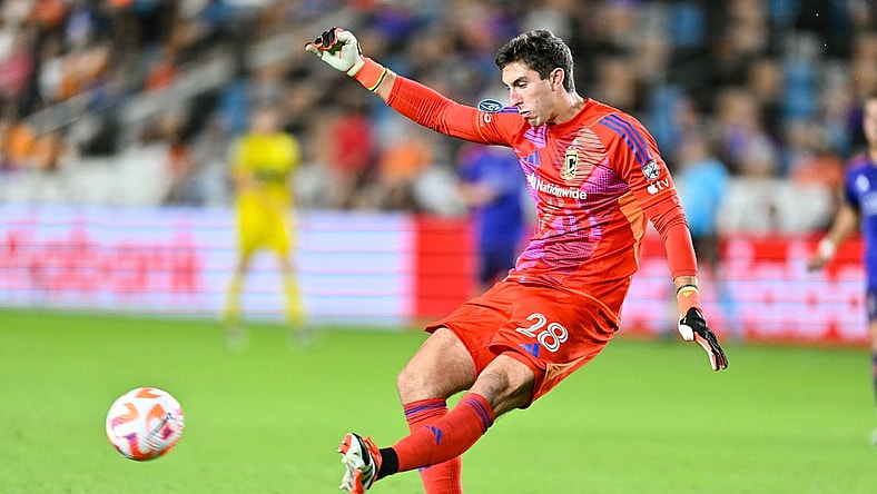 Columbus Crew goalkeeper Patrick Schulte (28) clears the balll during the second half against Houston Dynamo FC at Shell Energy Stadium. Mandatory Credit: Maria Lysaker-USA TODAY Sports