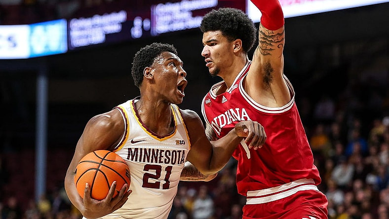 Mar 6, 2024; Minneapolis, Minnesota, USA; Minnesota Golden Gophers forward Pharrel Payne (21) works around Indiana Hoosiers center Kel'el Ware (1)  during the first half at Williams Arena. Mandatory Credit: Matt Krohn-USA TODAY Sports