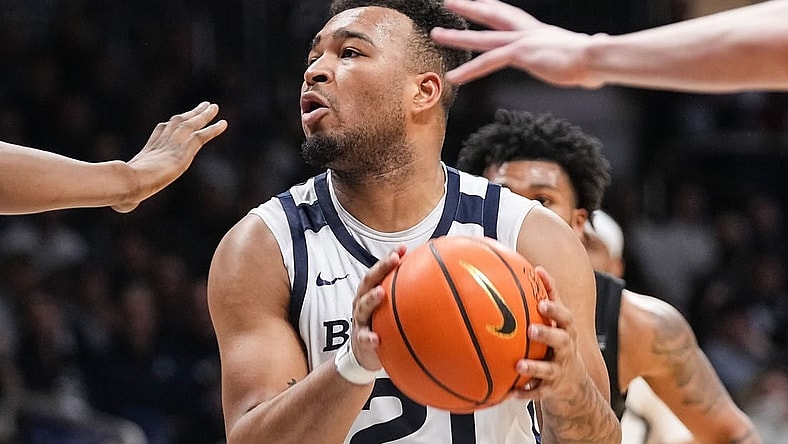 Butler Bulldogs guard Pierre Brooks II (21) searches to pass the ball Wednesday, March 6, 2024, during the game at Hinkle Fieldhouse in Indianapolis. The Butler Bulldogs defeated the Xavier Musketeers, 72-66.